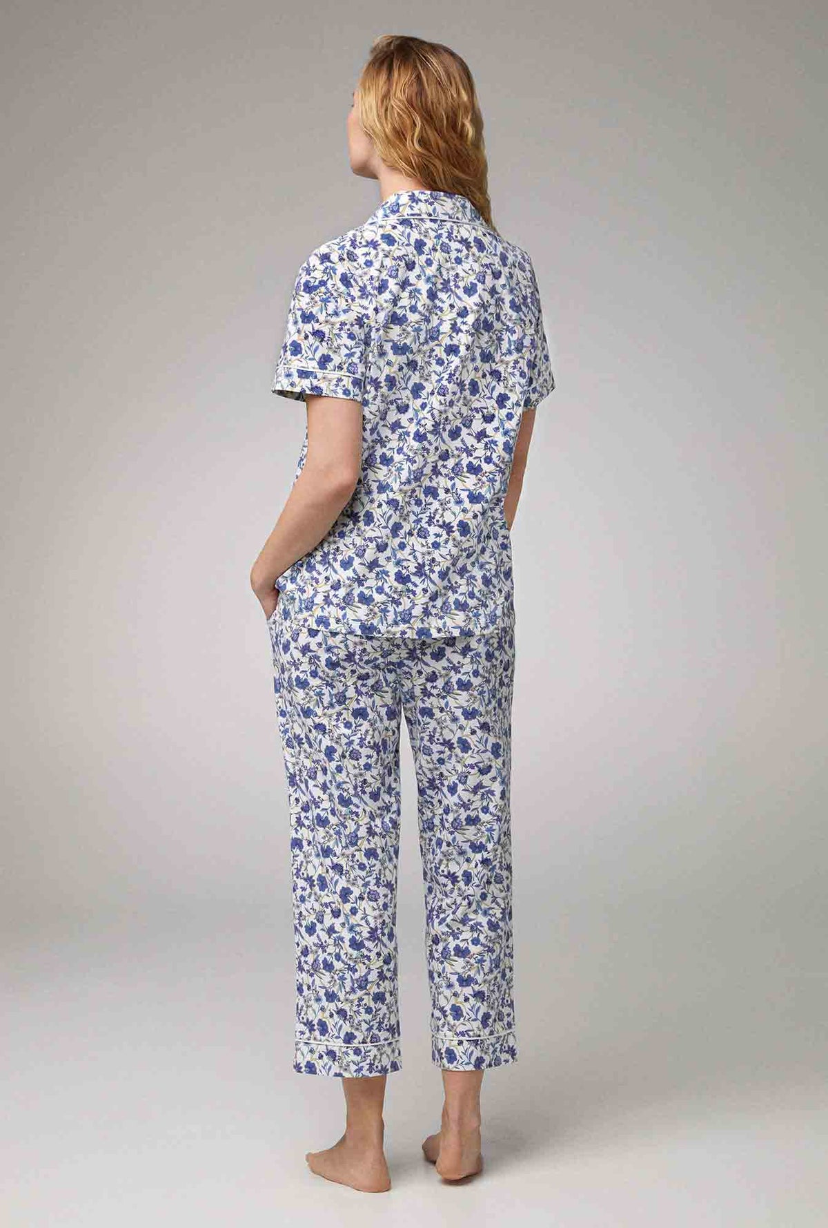 A lady wearing Short Sleeve Classic Stretch Jersey Cropped PJ Set with Terrance Floral print