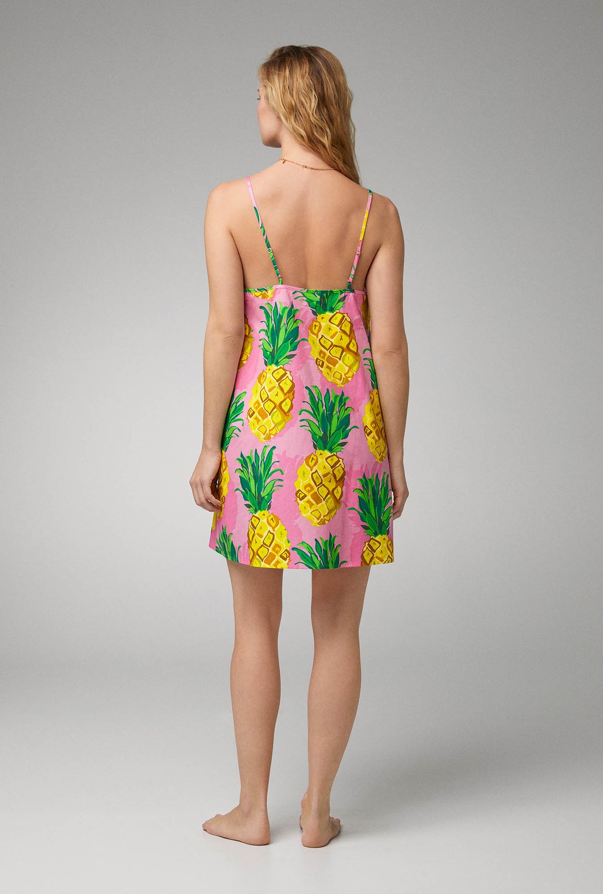 A lady wearing Woven Poplin Chemise with Pineapple print