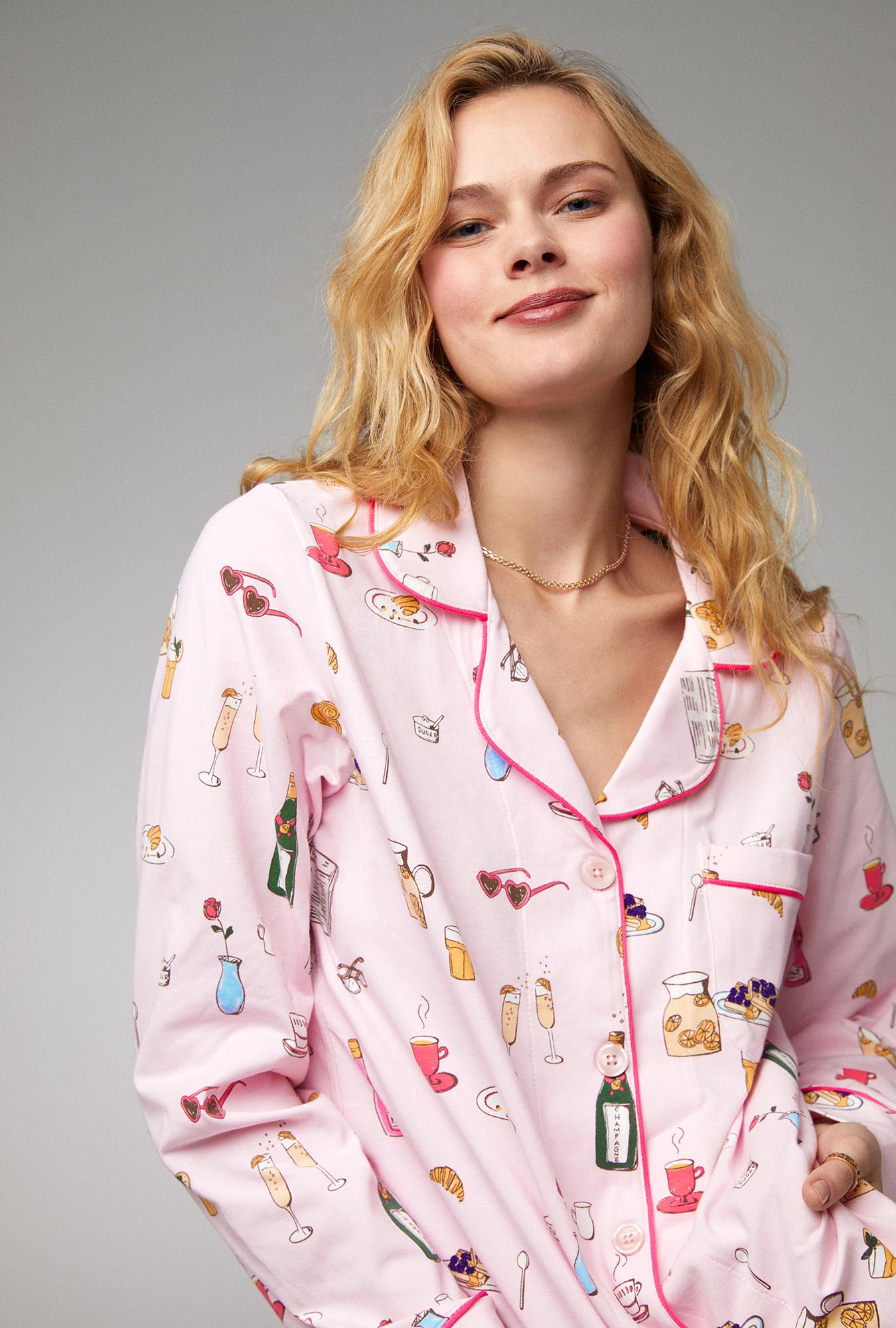 A lady wearing Long Sleeve Classic Stretch Jersey PJ Set with Let's Do Brunch print