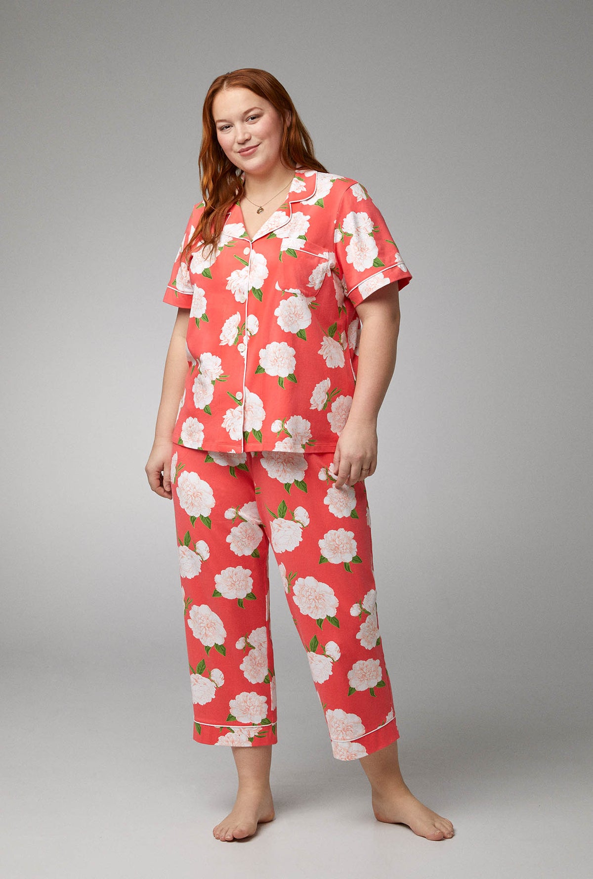 A lady wearing Short Sleeve Classic Stretch Jersey Cropped PJ Set with Perfect Peonies print