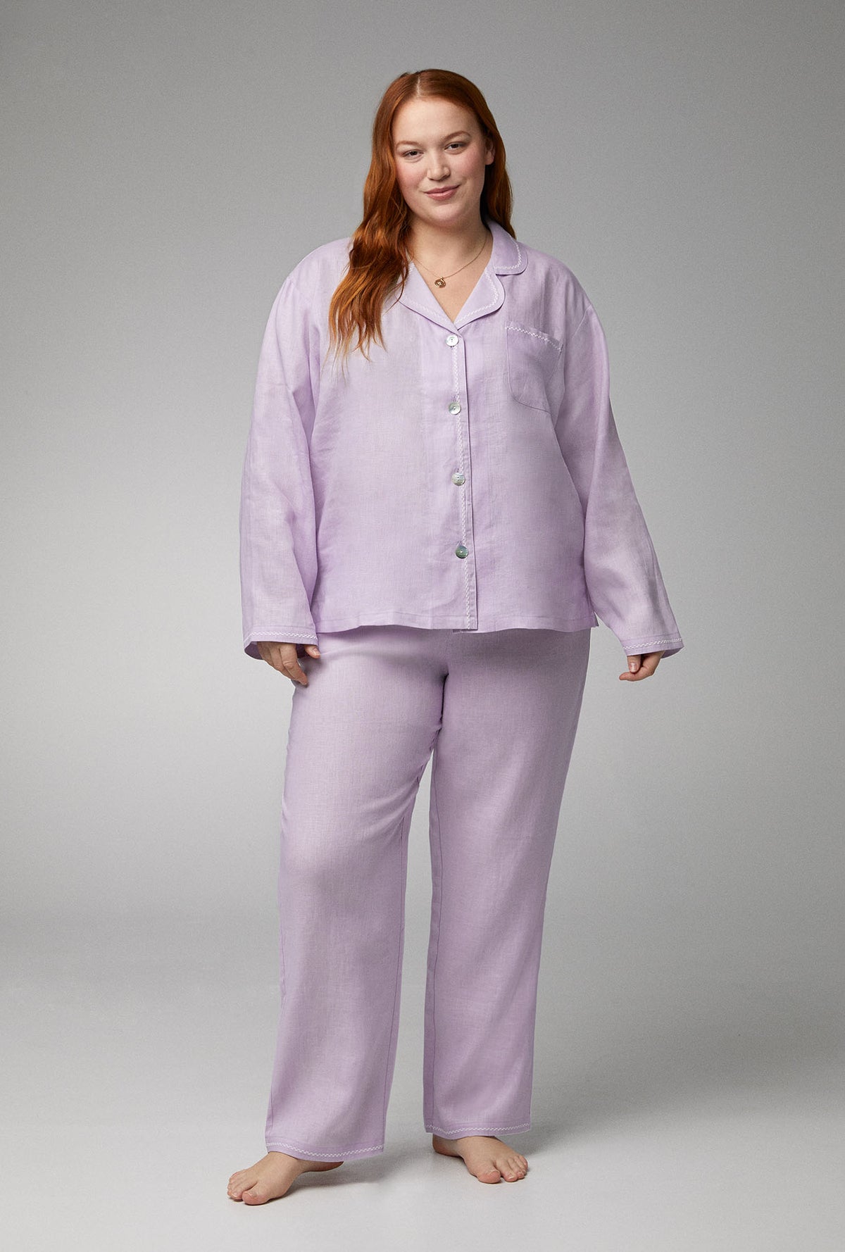 A lady wearing Long Sleeve Classic Woven Linen PJ Set with Orchid Petal print